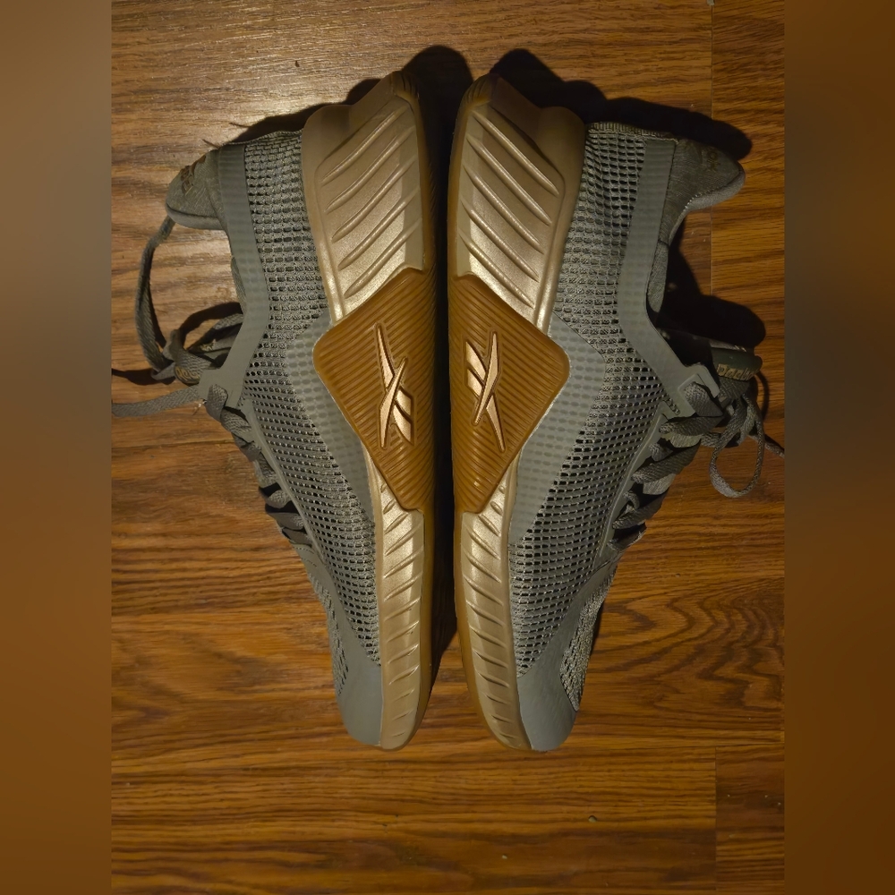 Size 10 Reebok Womens Gray and Goldish Colored Sneakers. Breathable Mesh.